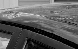 Vehicle hail damage and dent repair